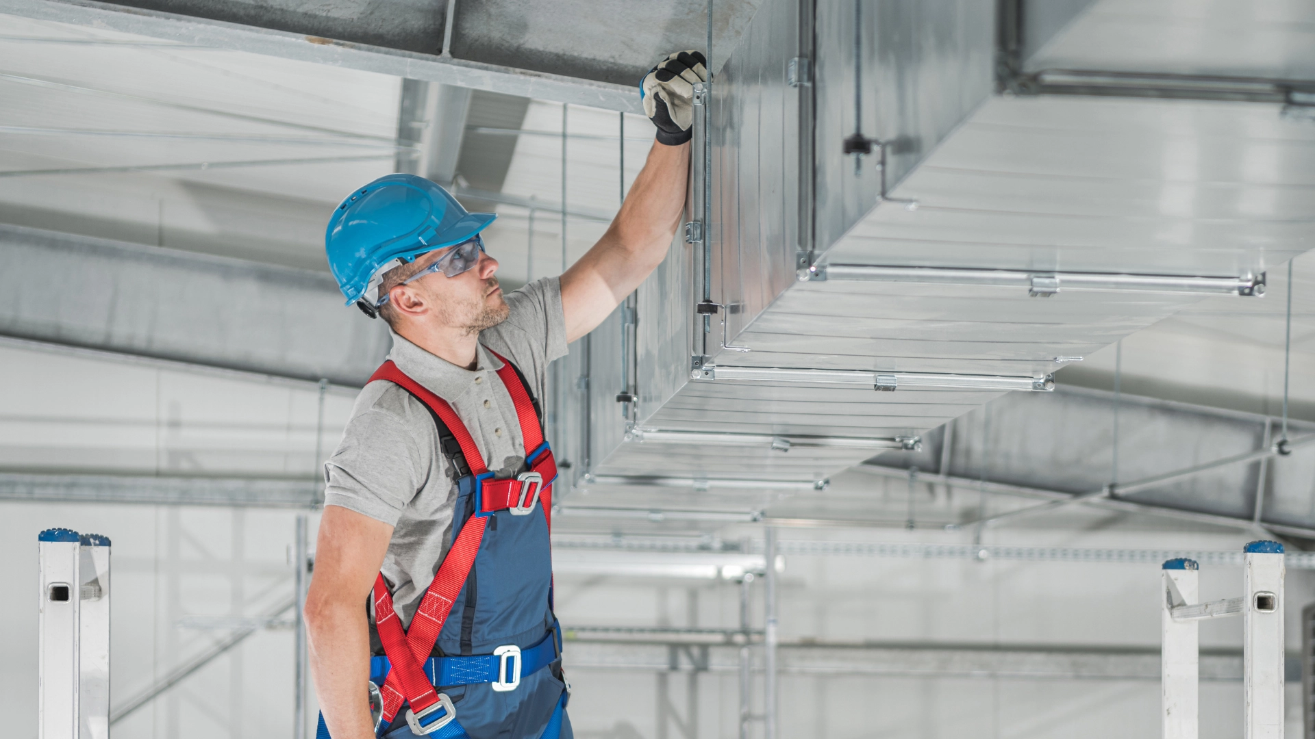 AC expert checking the ducts in a forced air system