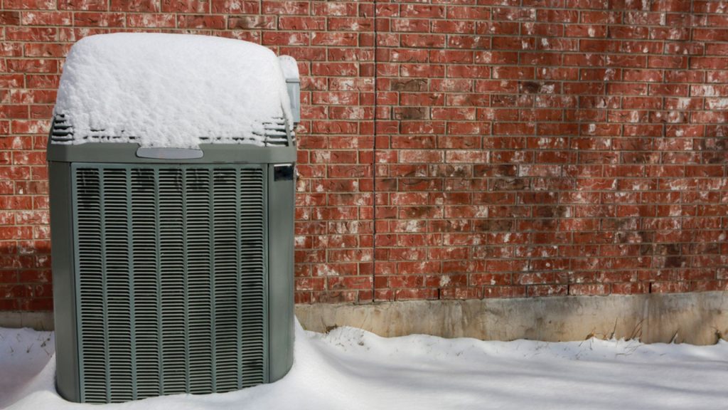 central ac outdoor unit in the winter