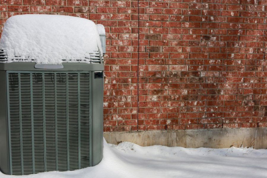 central ac outdoor unit in the winter